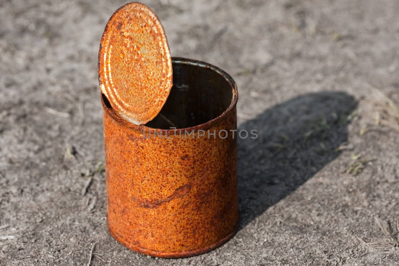 Empty rusty preserved food metal tin container can