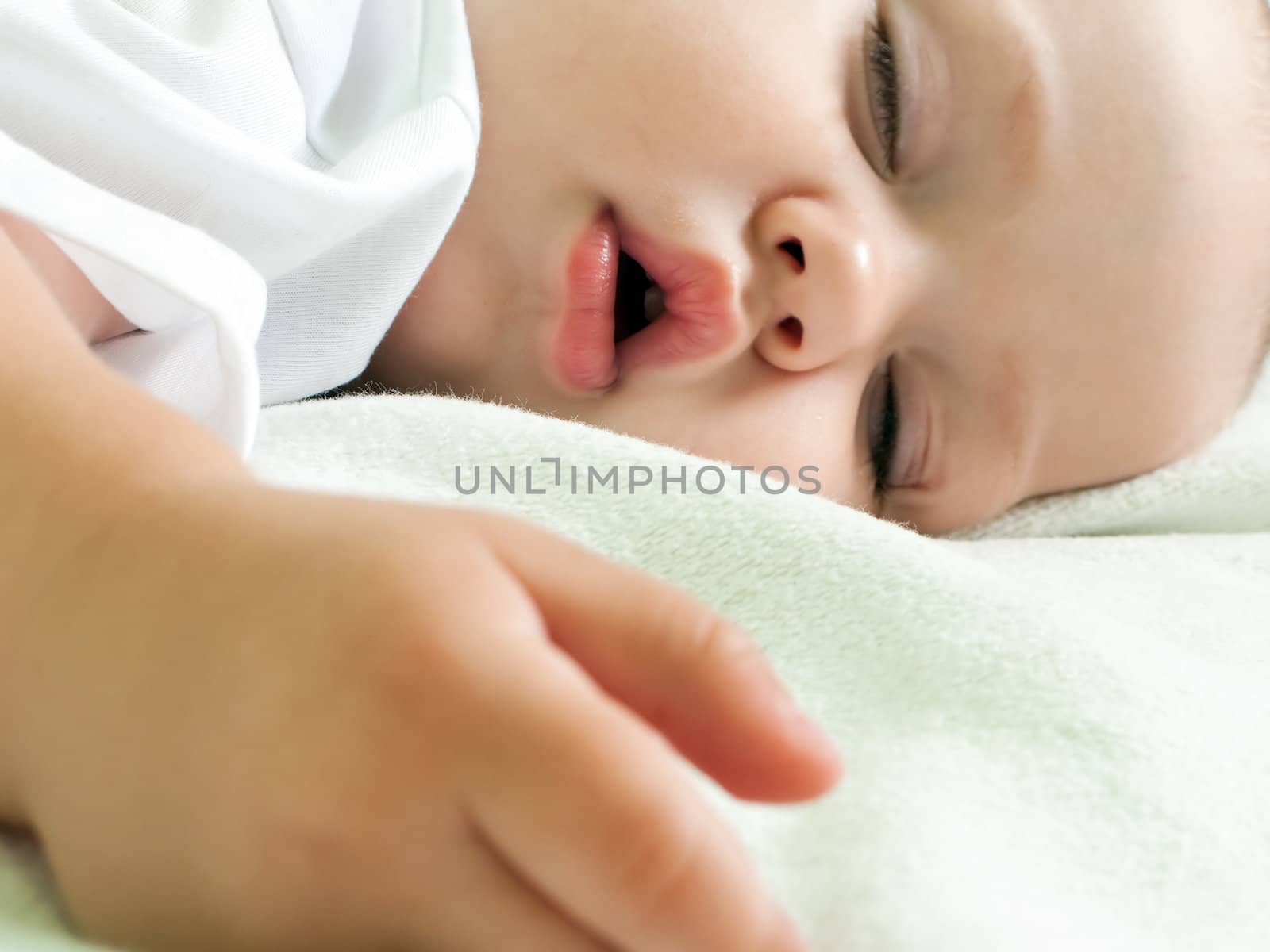 Little child sleeping in happiness and family love