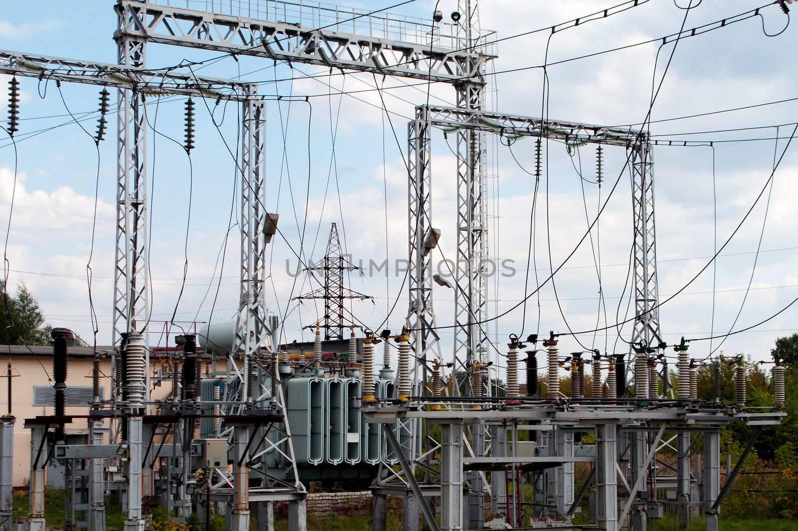 Electricity tower with power line cable and blue sky