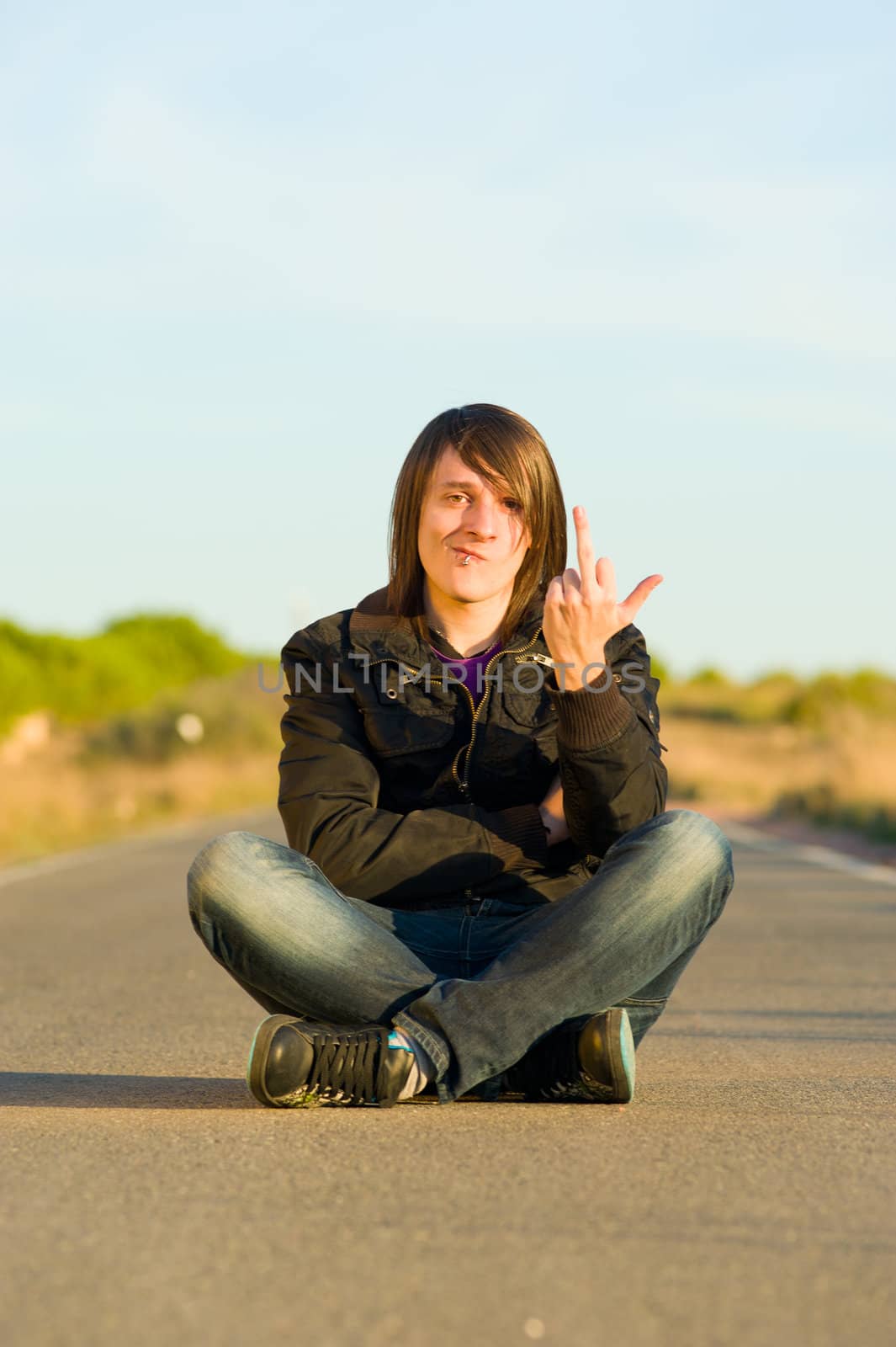 Young male demonstrating and showing his displeasure