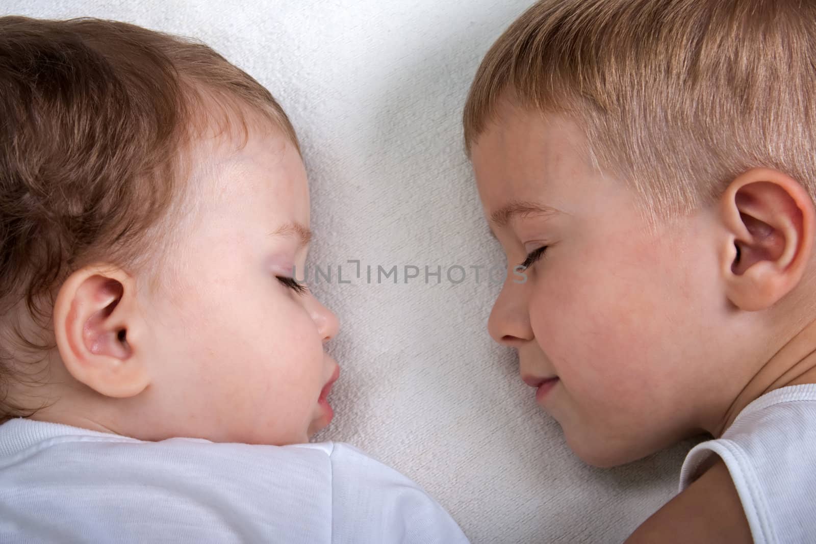 Little child sleeping in happiness and family love