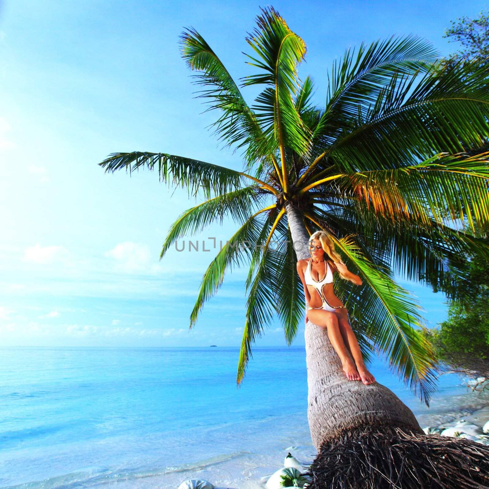 woman on palm sea on backgroud