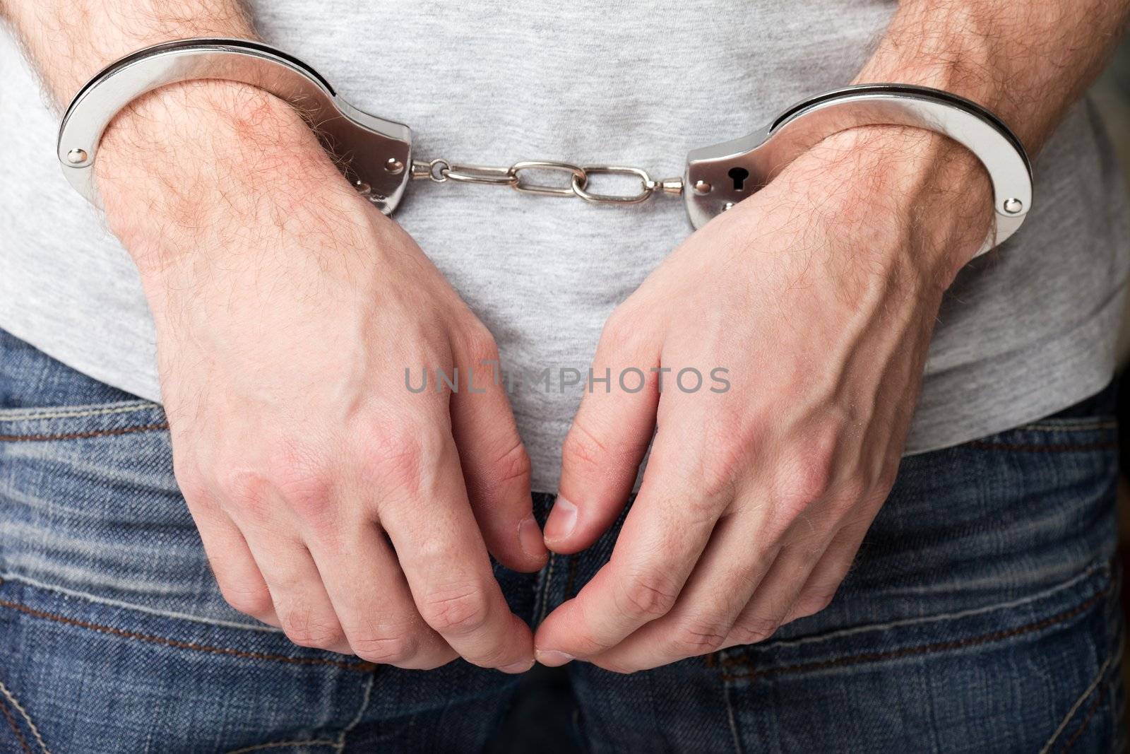 Police law steel handcuffs arrest crime human hand