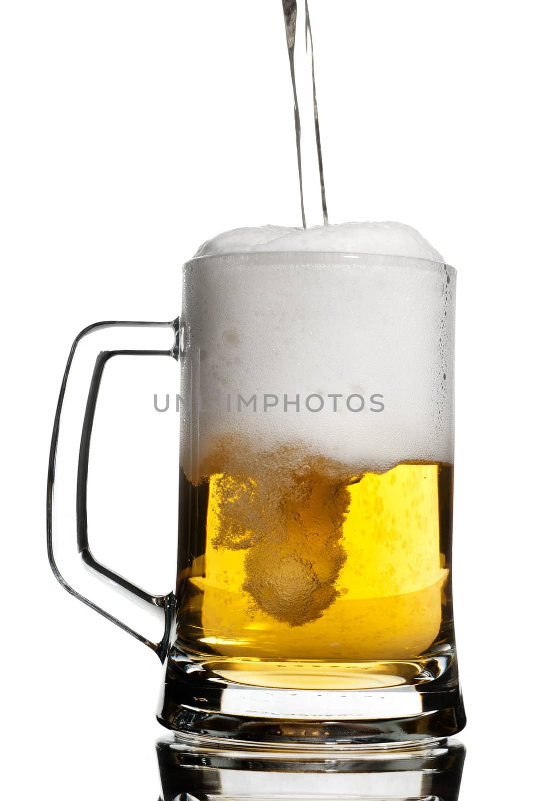 Reflection keg with light beer isolated on white