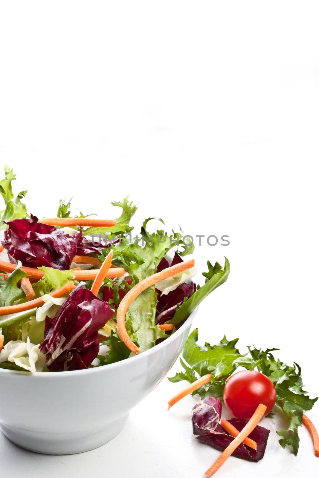 mixed salad on a bowl - withe background