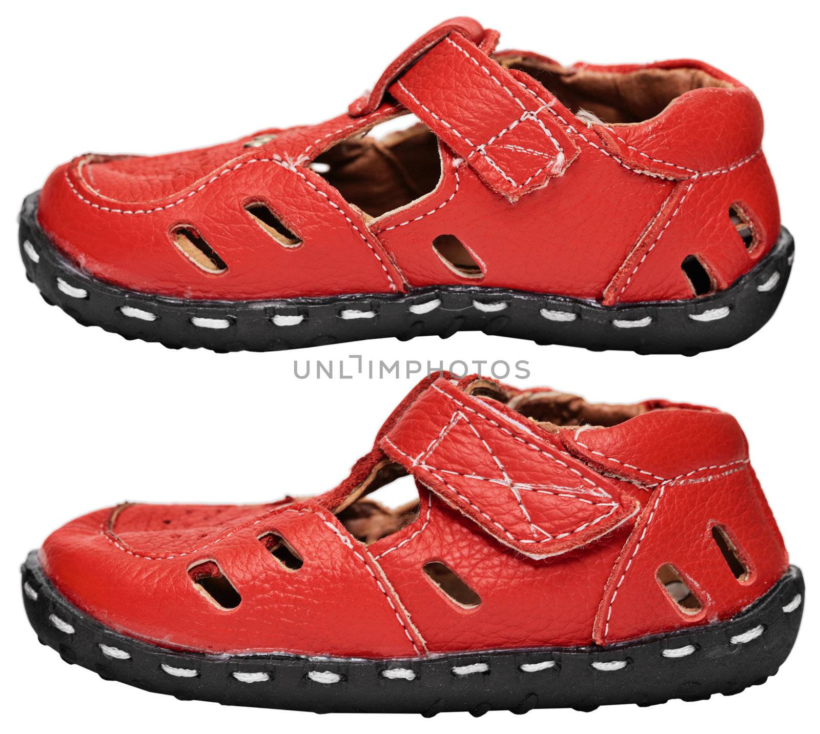 Kids red leather sandals on white by pzaxe