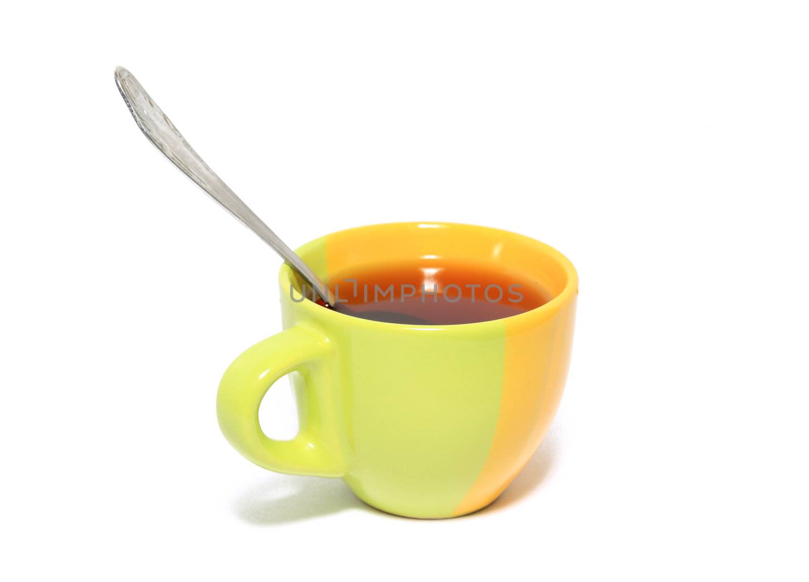 yellow cup on white background