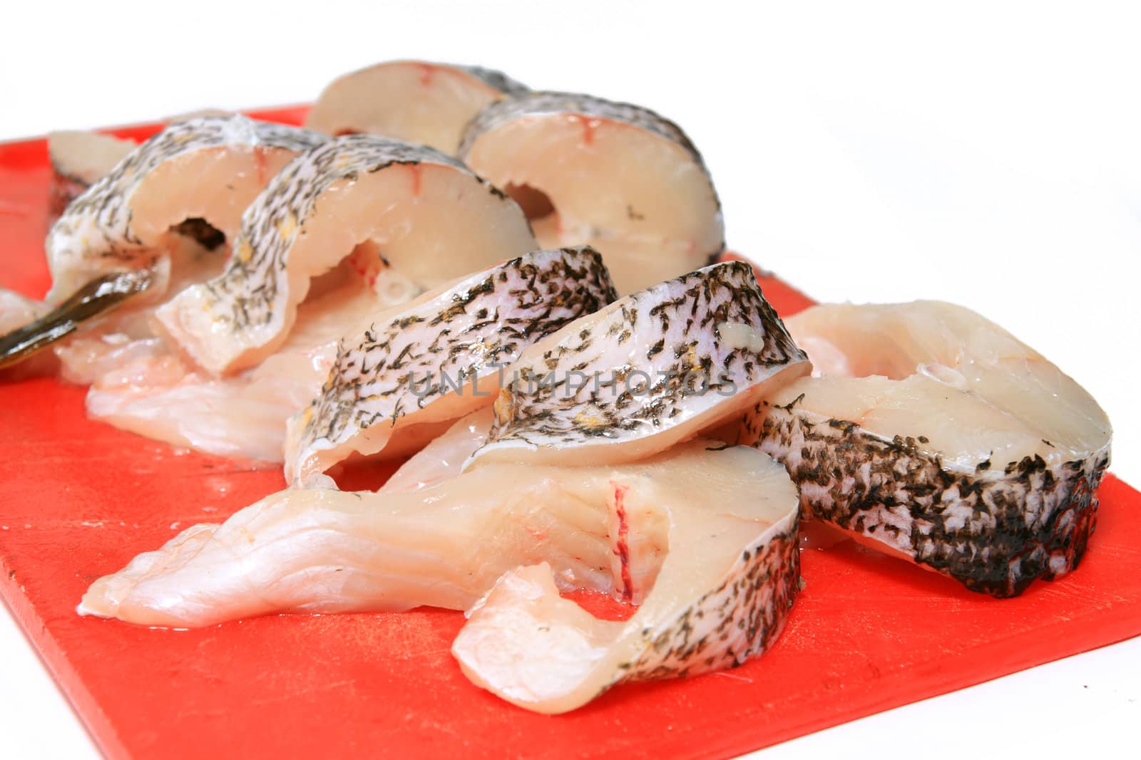 cut fish on white background