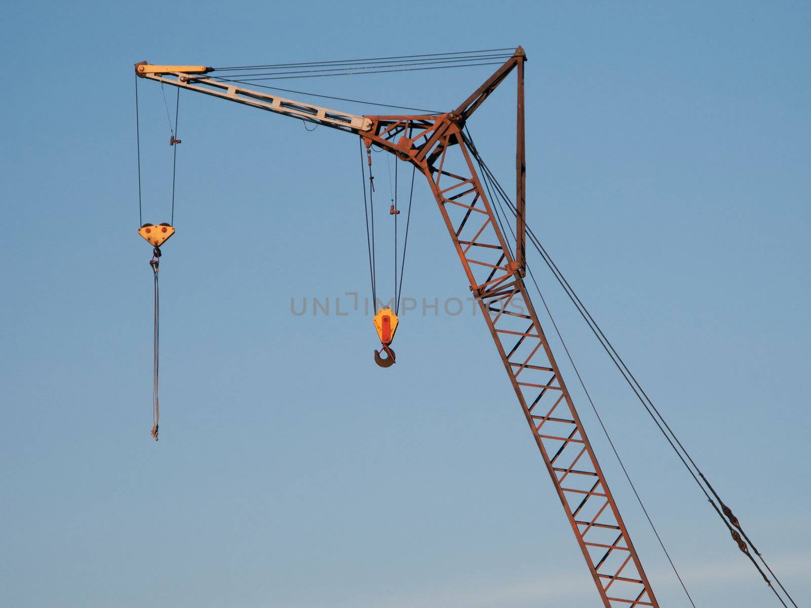 Building crane boom with steel hook