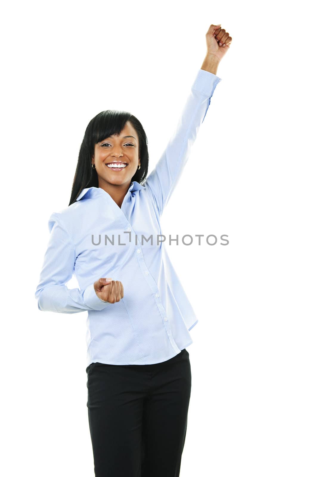Excited black woman raising arm in victory isolated on white background