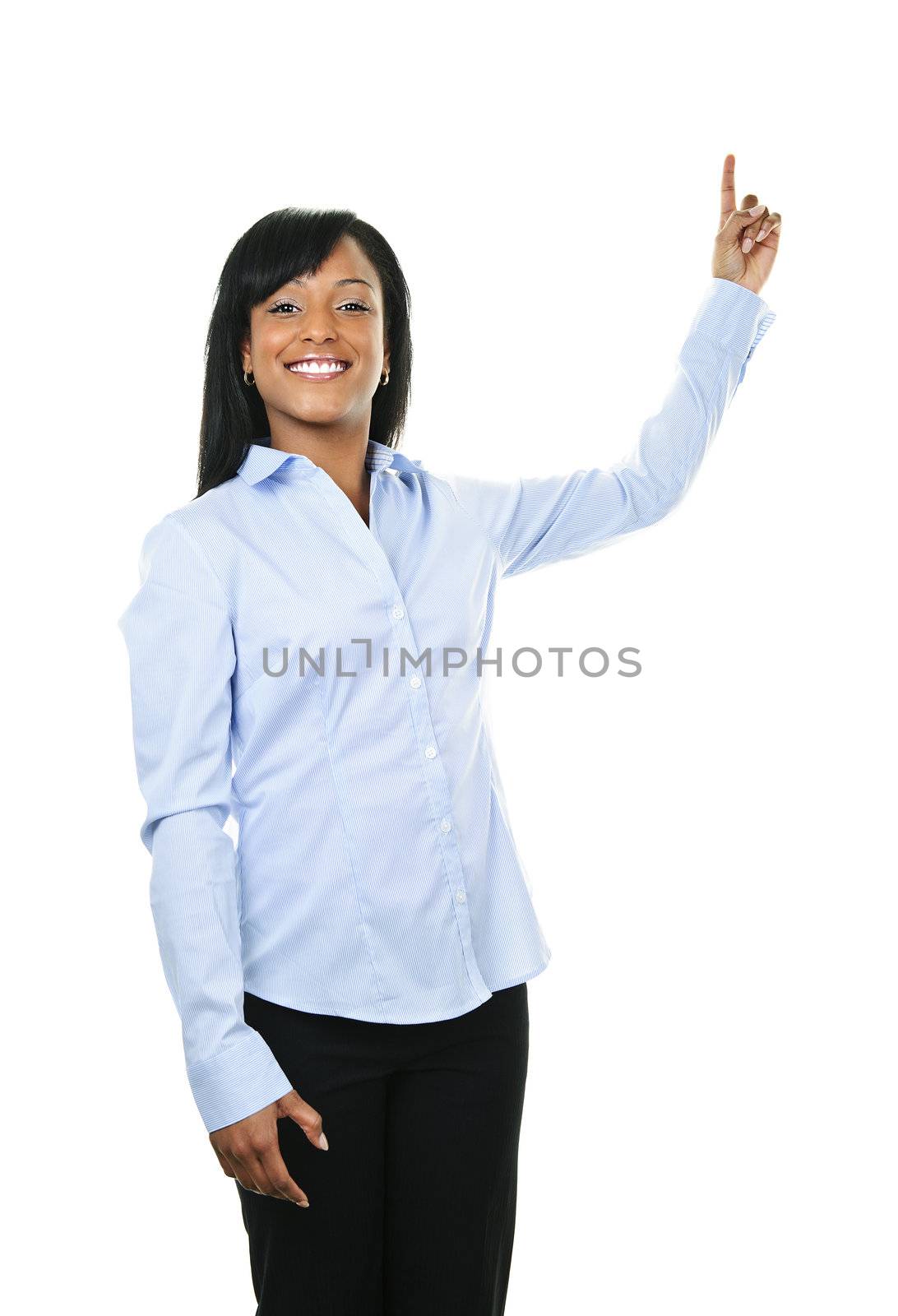 Smiling black woman pointing up isolated on white background