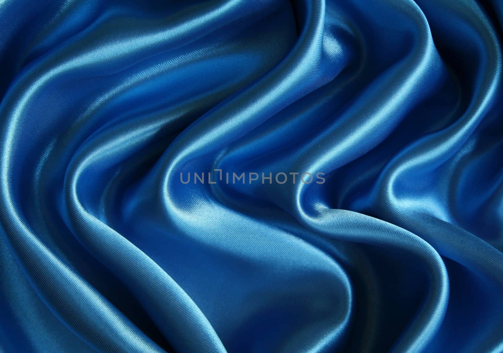 Smooth elegant dark blue silk can use as background 