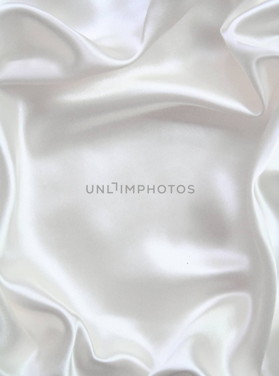 Smooth elegant white silk can use as wedding background 