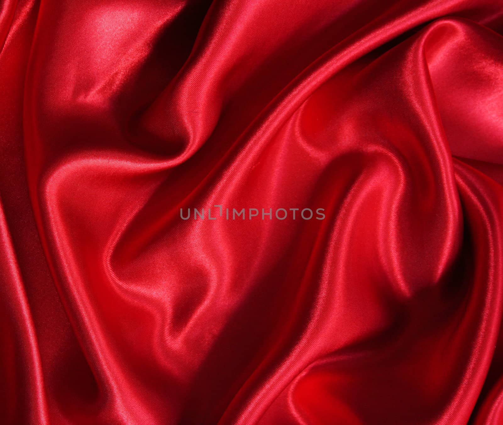 Smooth elegant red silk can use as background 