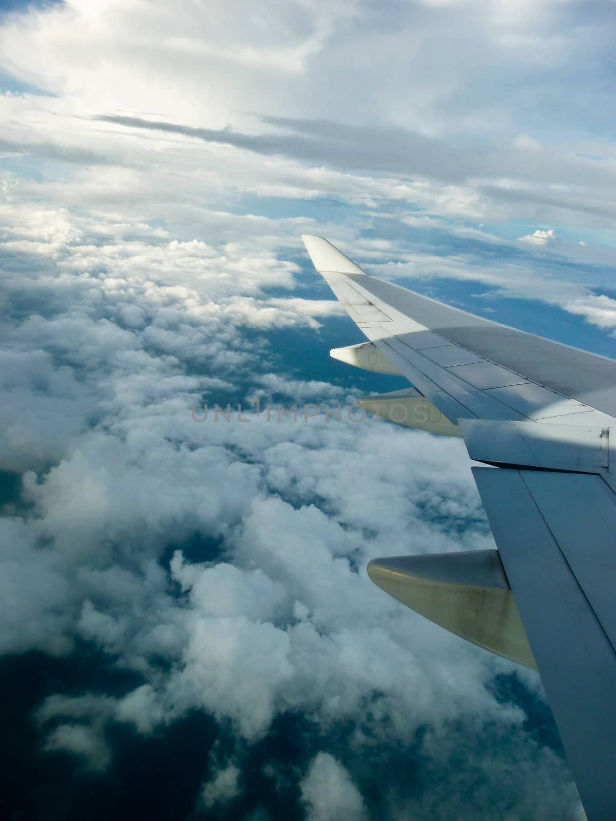 Clouds over Hindi ocean view on board flight at 35,000 feets