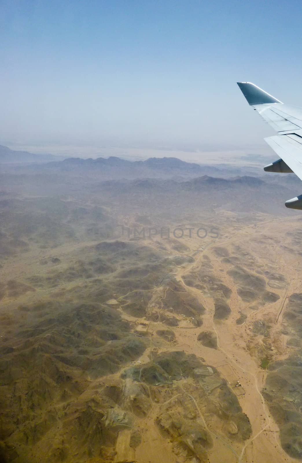 an aerial view of a highland in the desert some where over Arab region