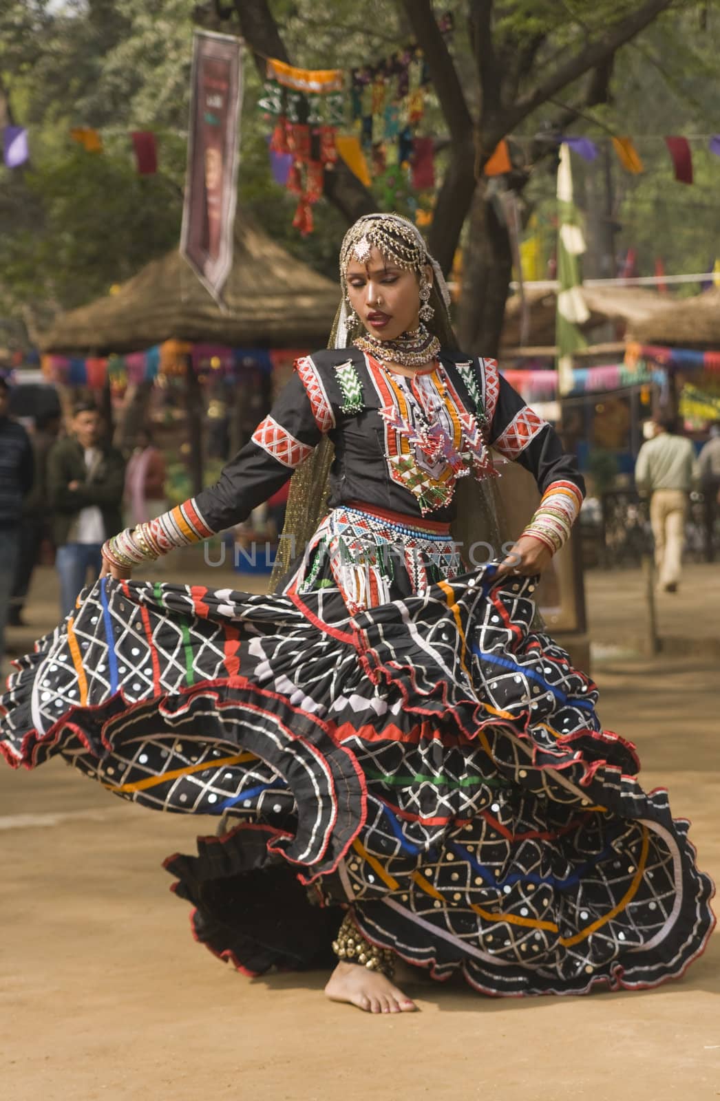 Tribal dancer in action at the annual  Sarujkund Fair near Delhi, India