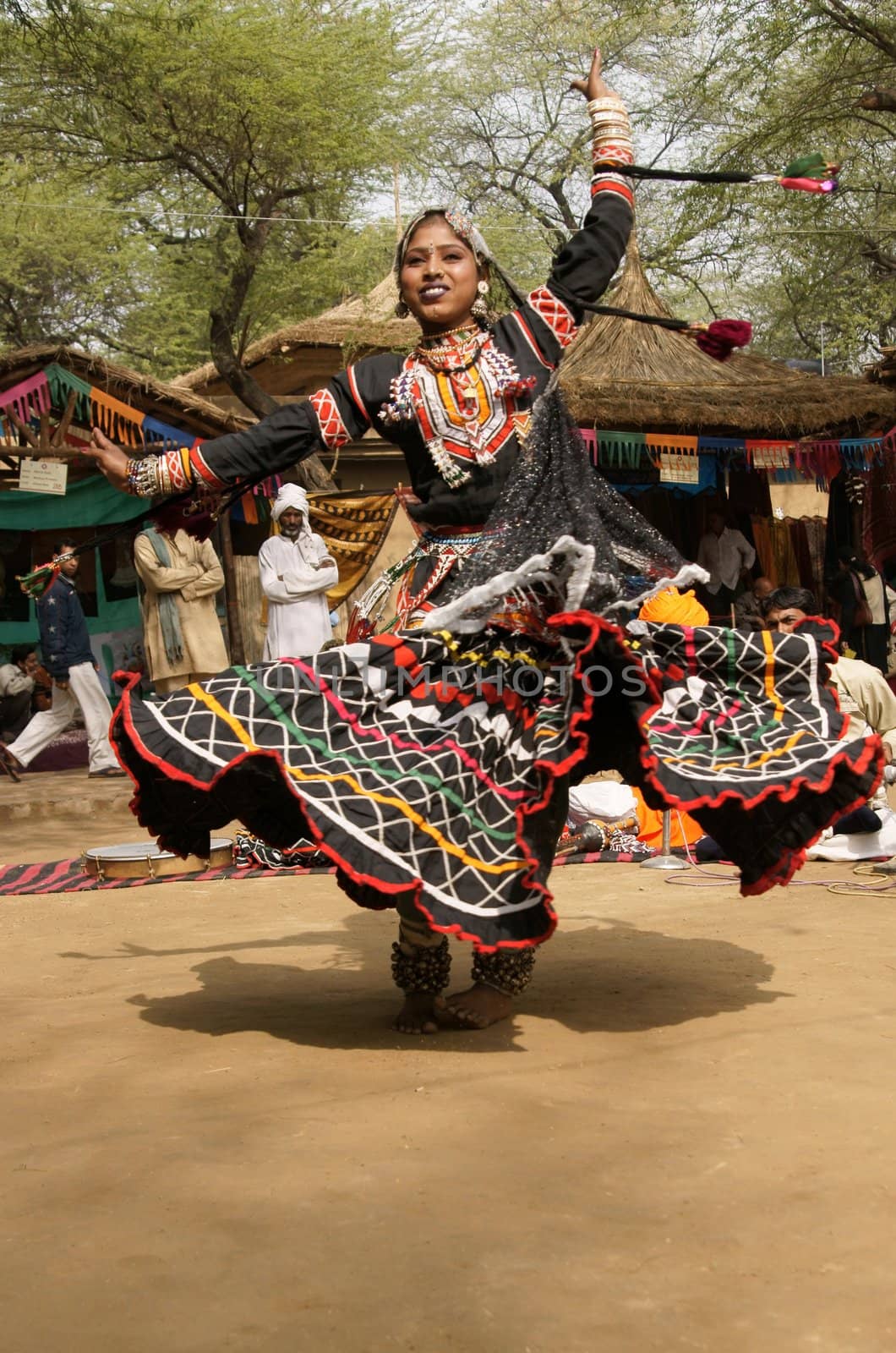 Tribal dancer in action at the annual  Sarujkund Fair near Delhi, India