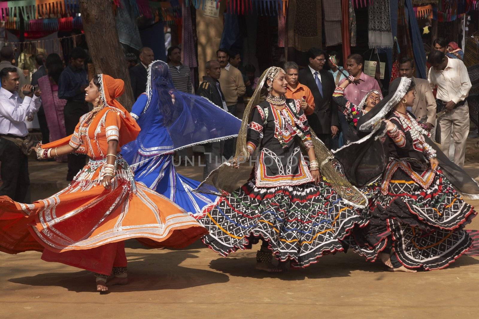 Tribal dancers in action at the Sarujkund Fair near Delhi, India.