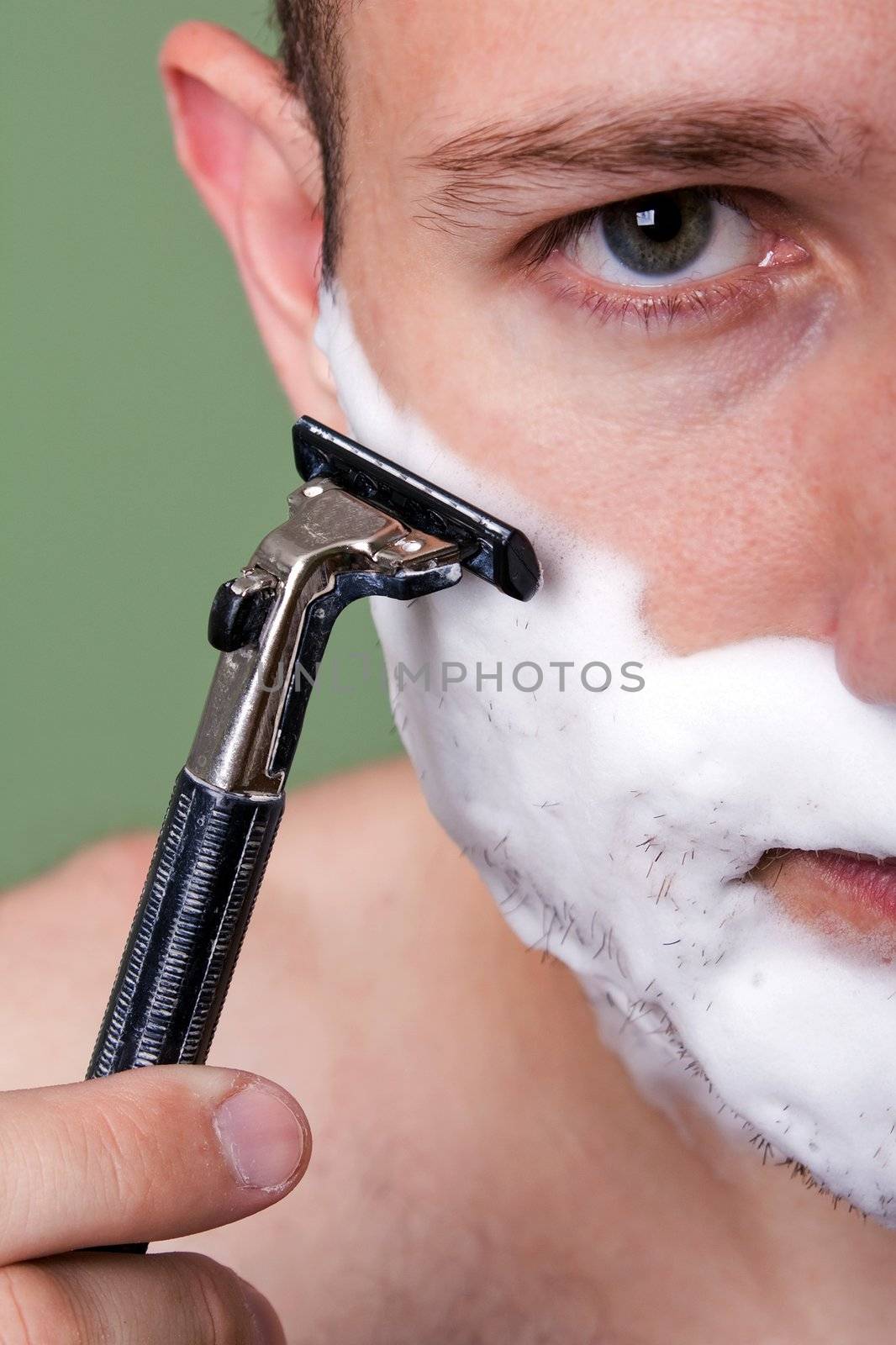 Beauty men with razor shaving blade cutting hair