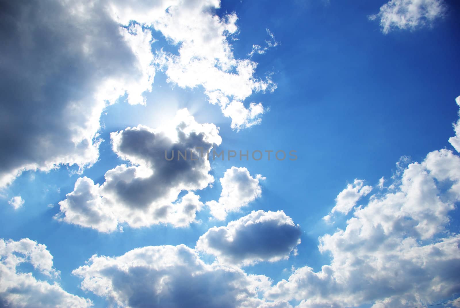 blue sky background with tiny clouds