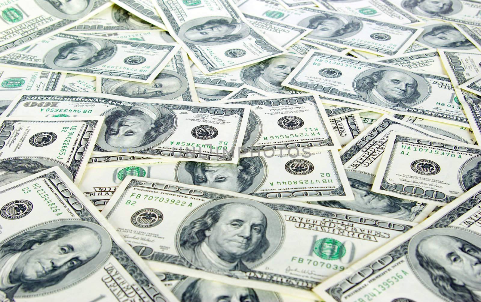 american dollars arranged at the background