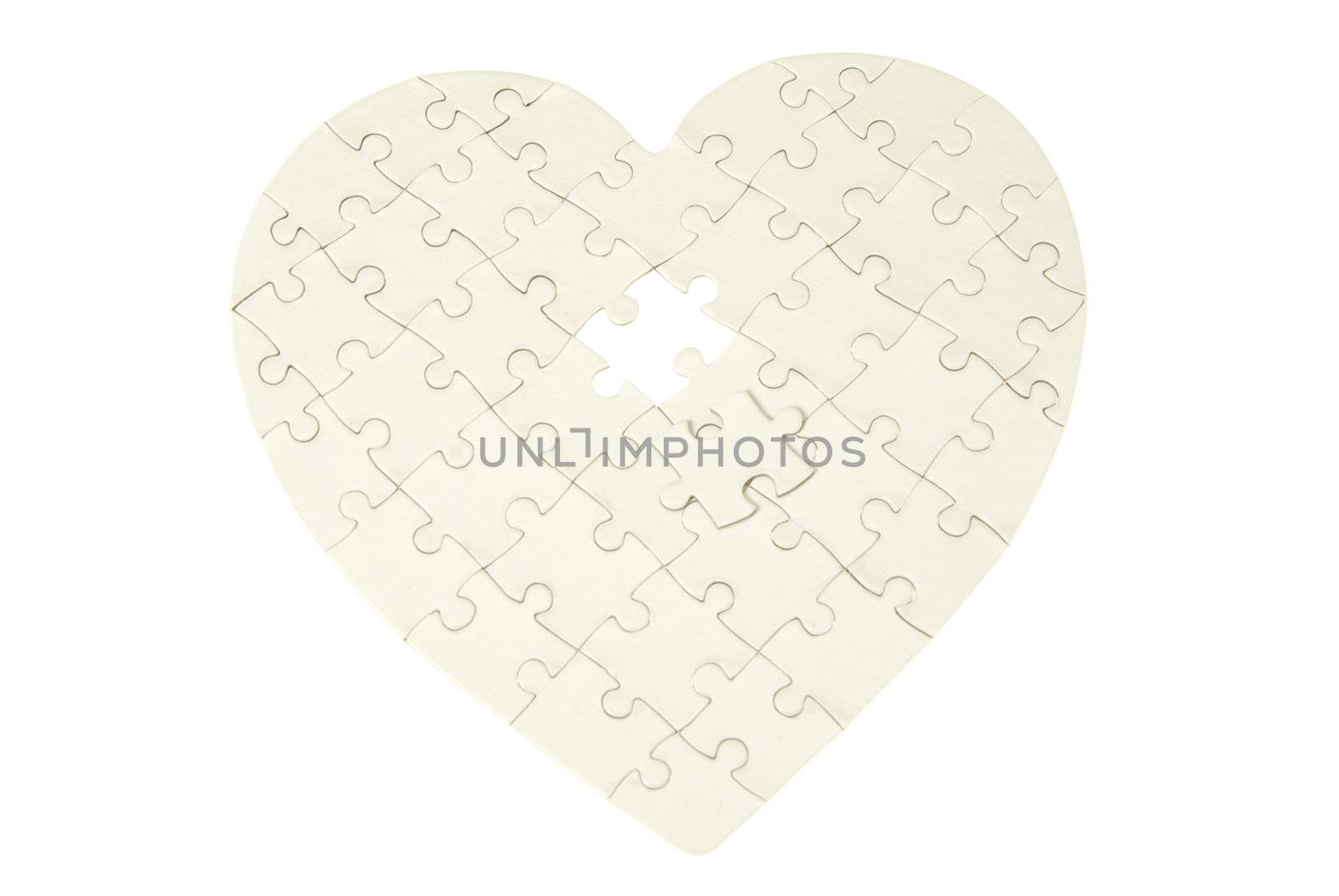 heart made from the puzzle on white