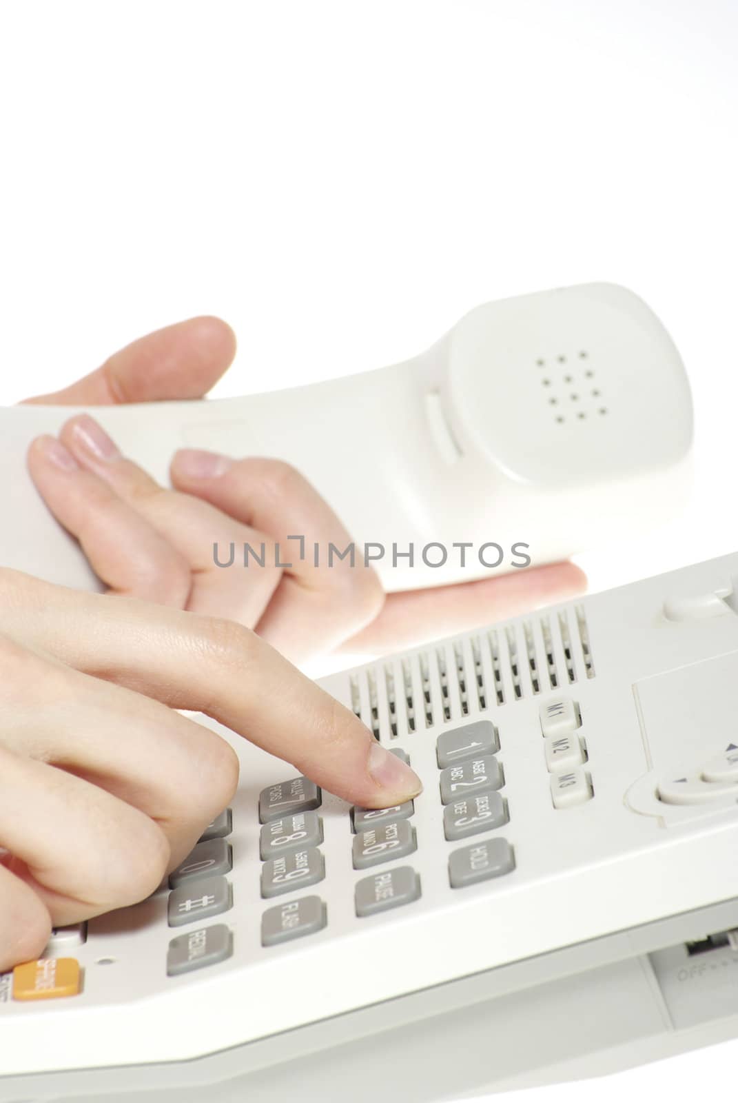 finger with  white telephone keypad