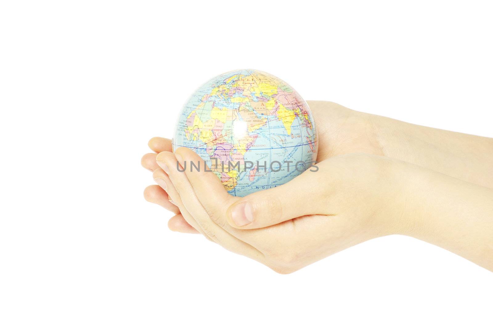 Hand holdings a globe on a white