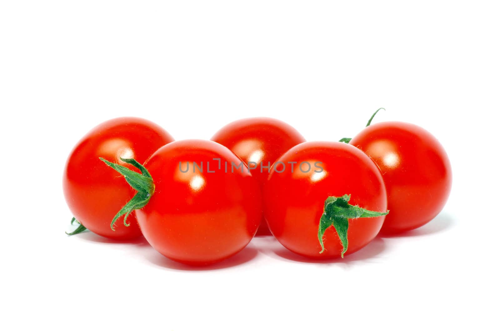 Fresh tomatoes isolated on white
