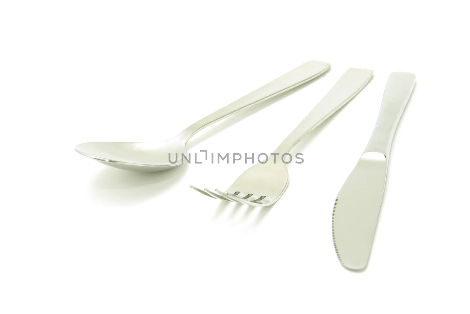 Fork, spoon and knife isolated on white background