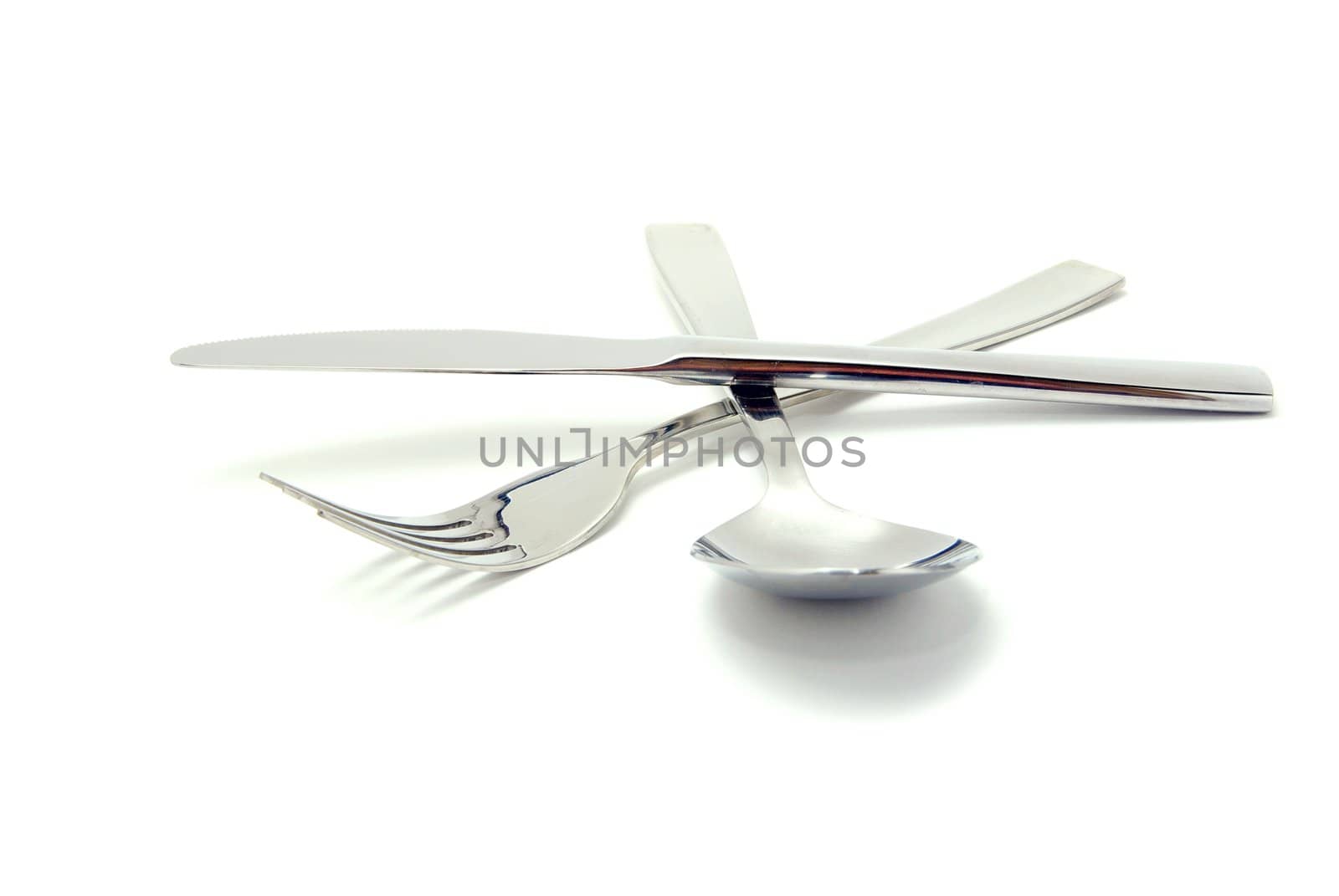 Fork, spoon and knife isolated on white background