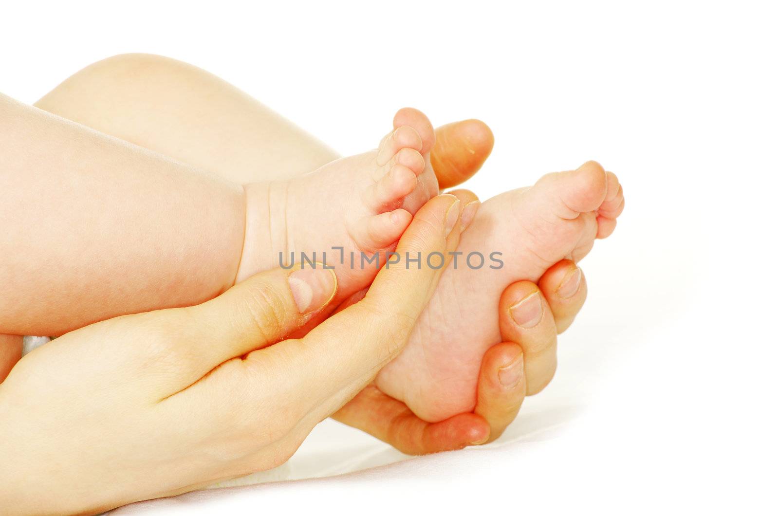 newborn baby feet isolated on white