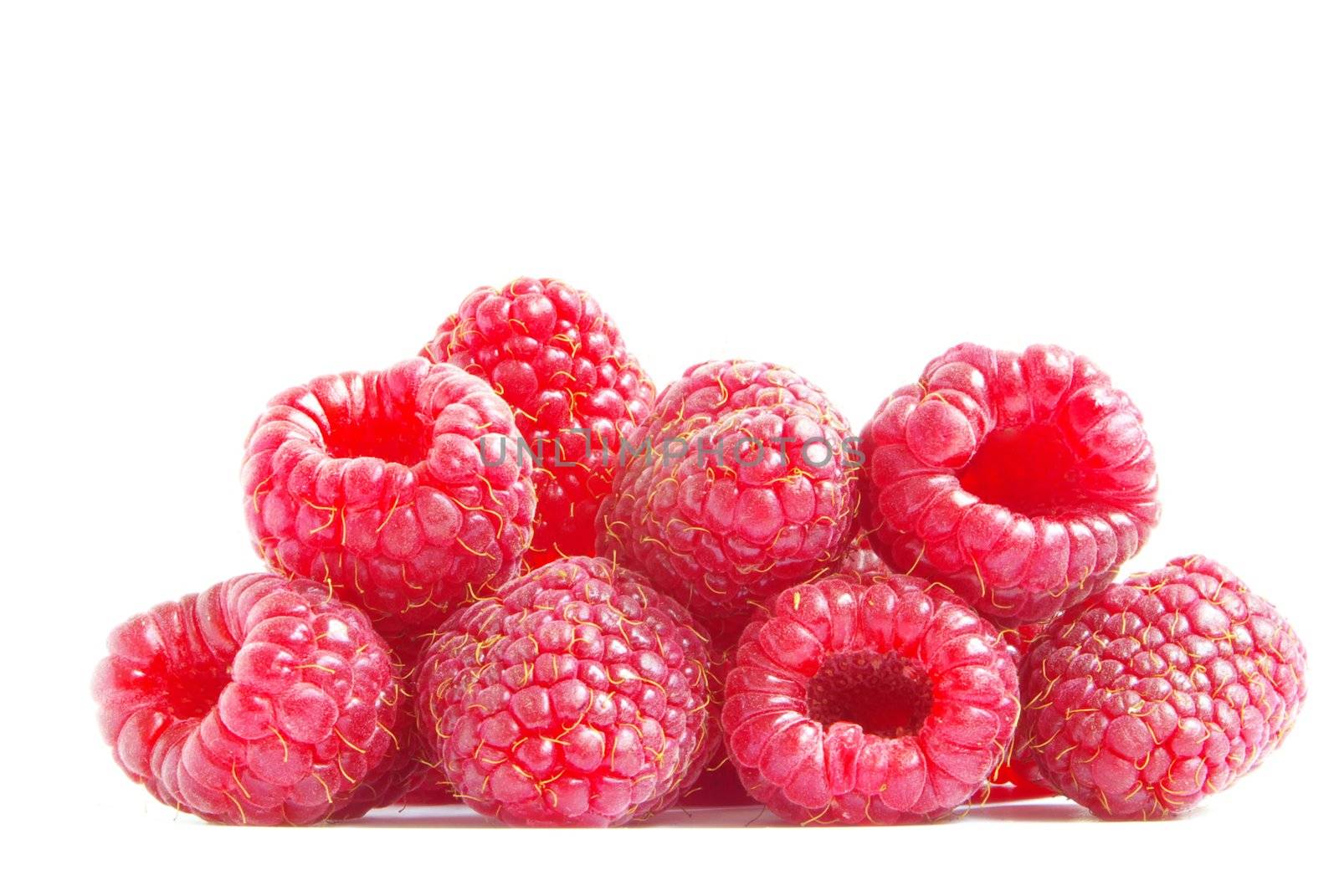 Ripe raspberry isolated on a white background