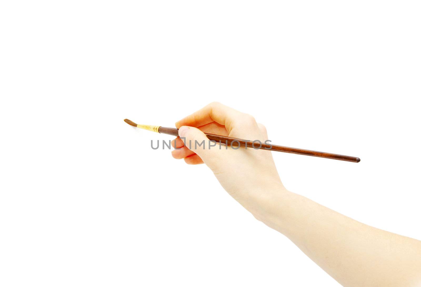 Isolated photo of a brush in a hand