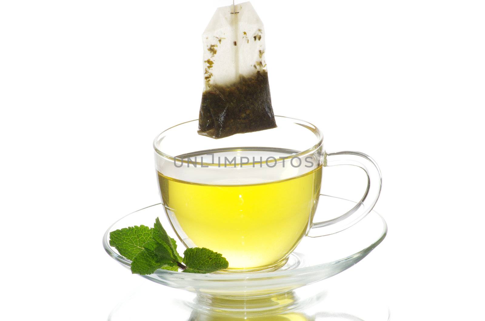 tea in cup with leaf mint  isolated on white background