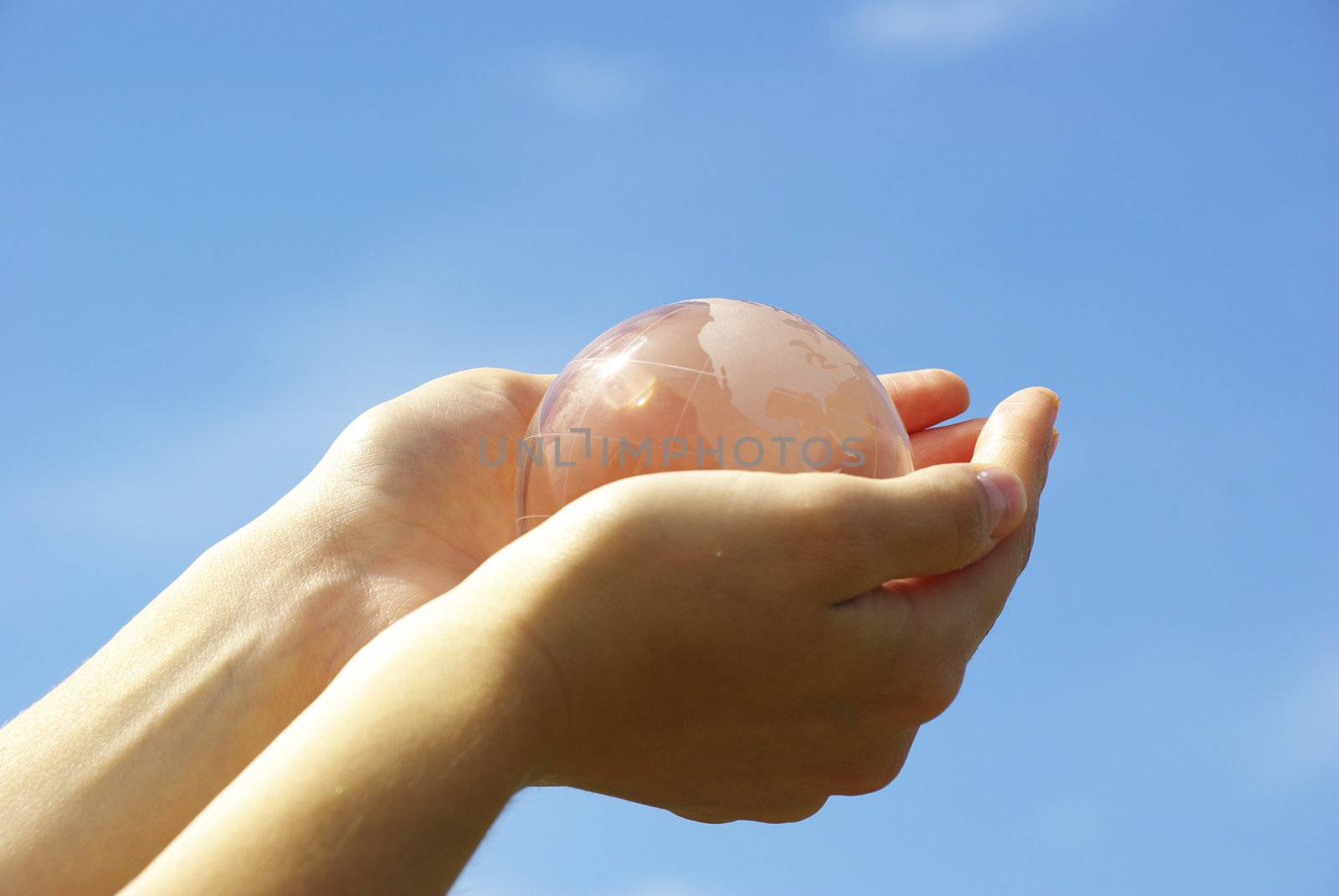 globe on the human hand