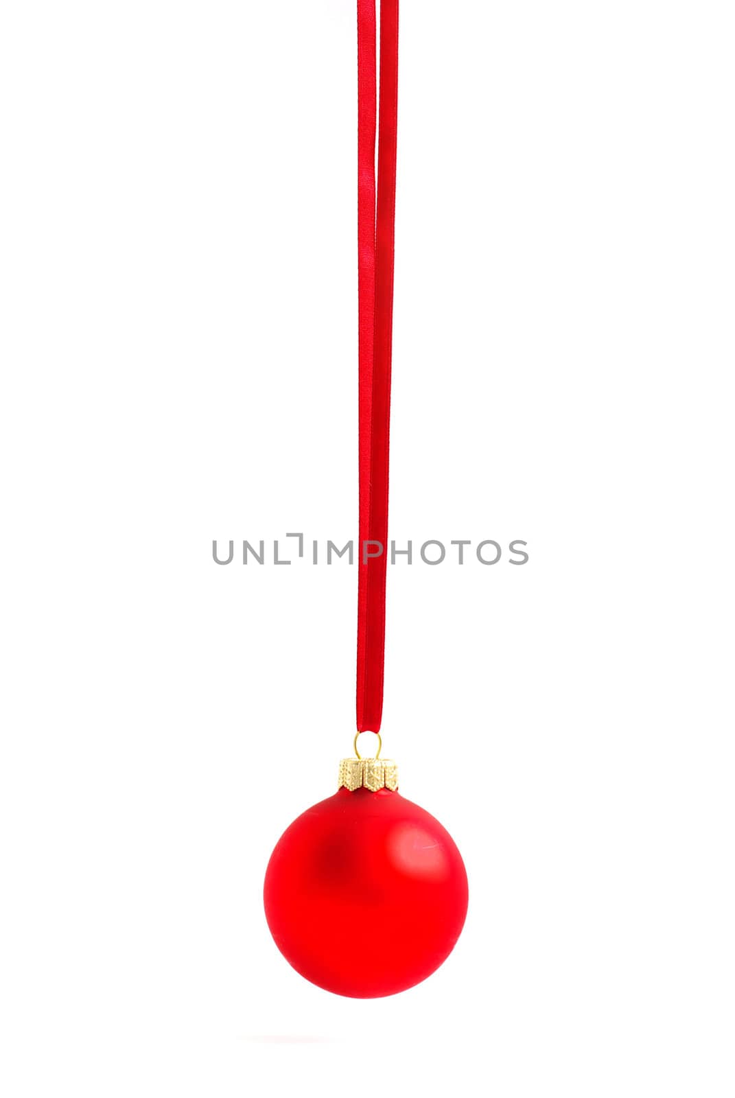 Christmas ball hanging with ribbons on white background