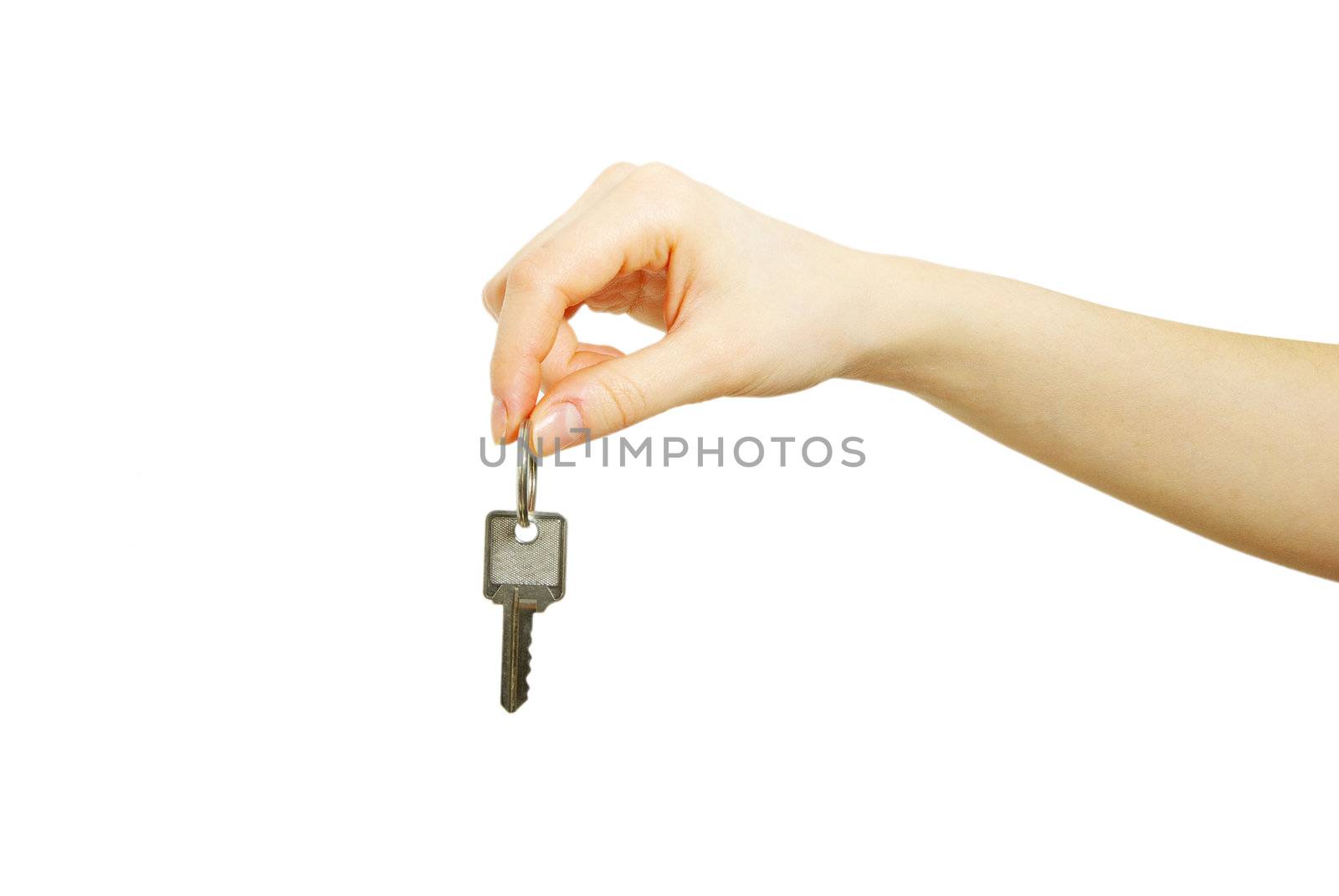 hand holds a key isolated on white