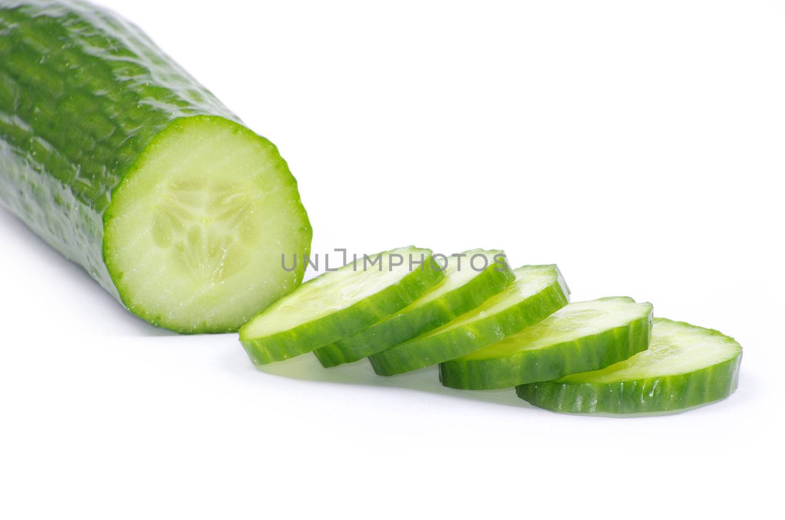 Cucumbers on the white background