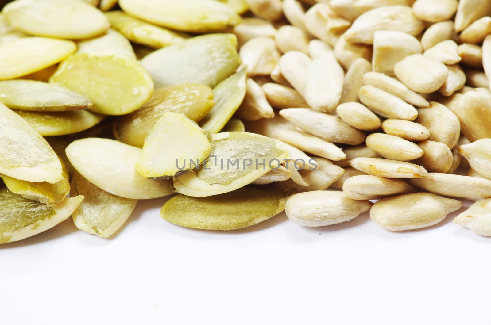 Close up image of sunflower and pumpkin seeds