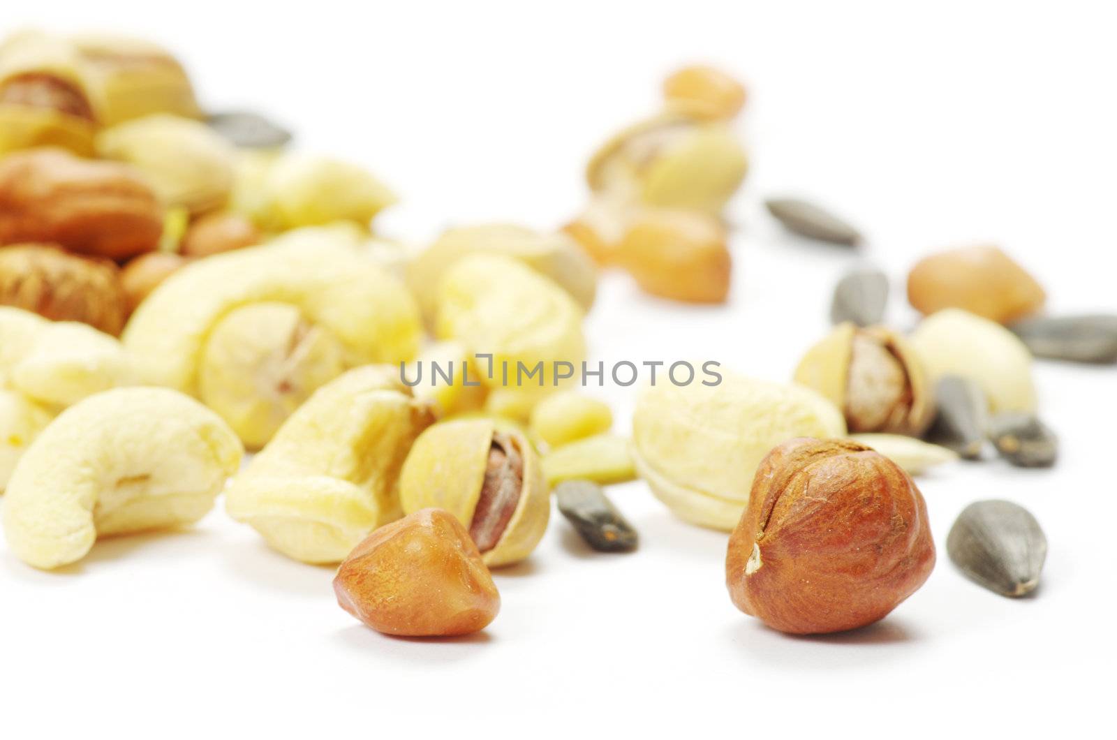 Assorted mixed nuts on white background
