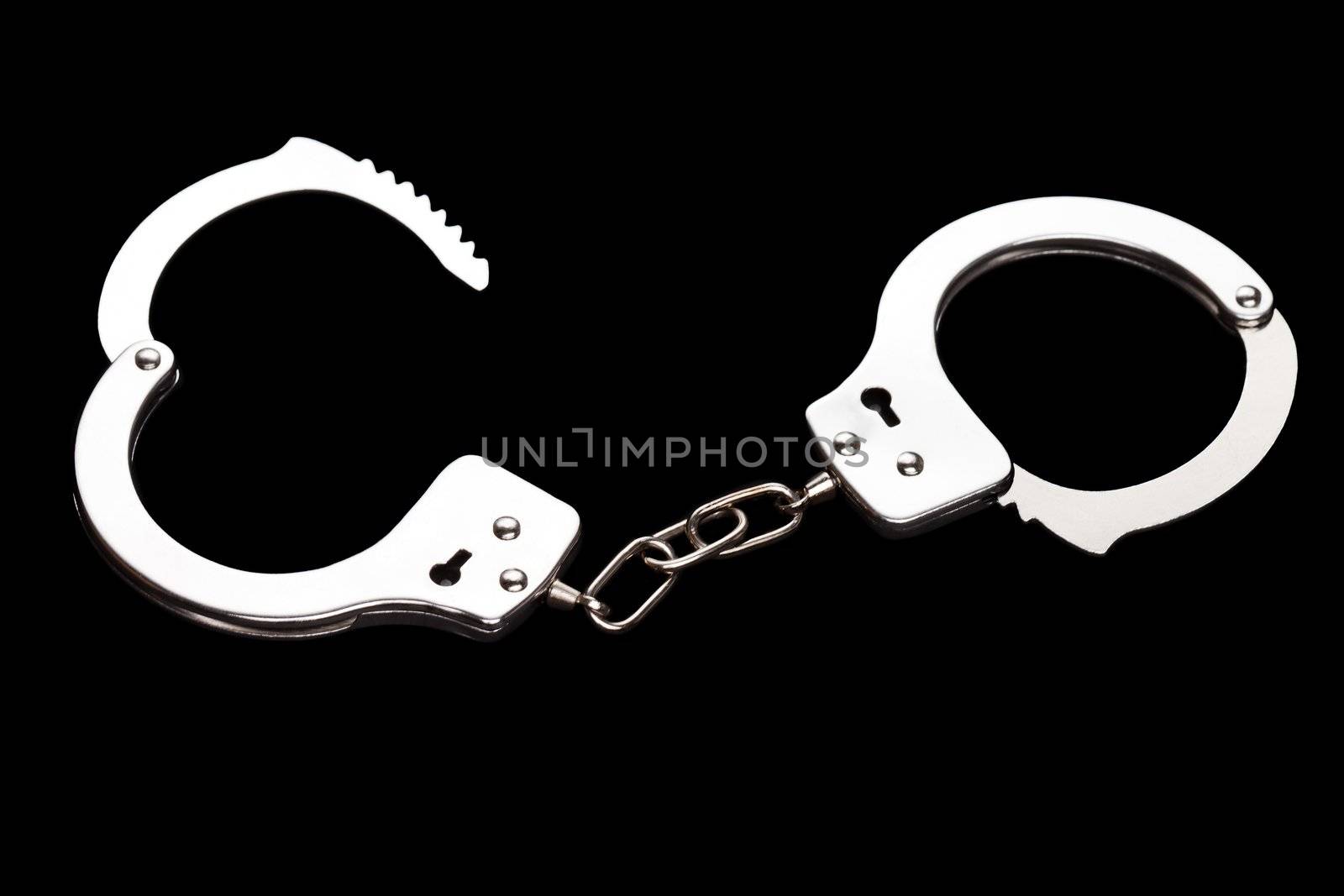 Crime law arrest police steel handcuffs isolated