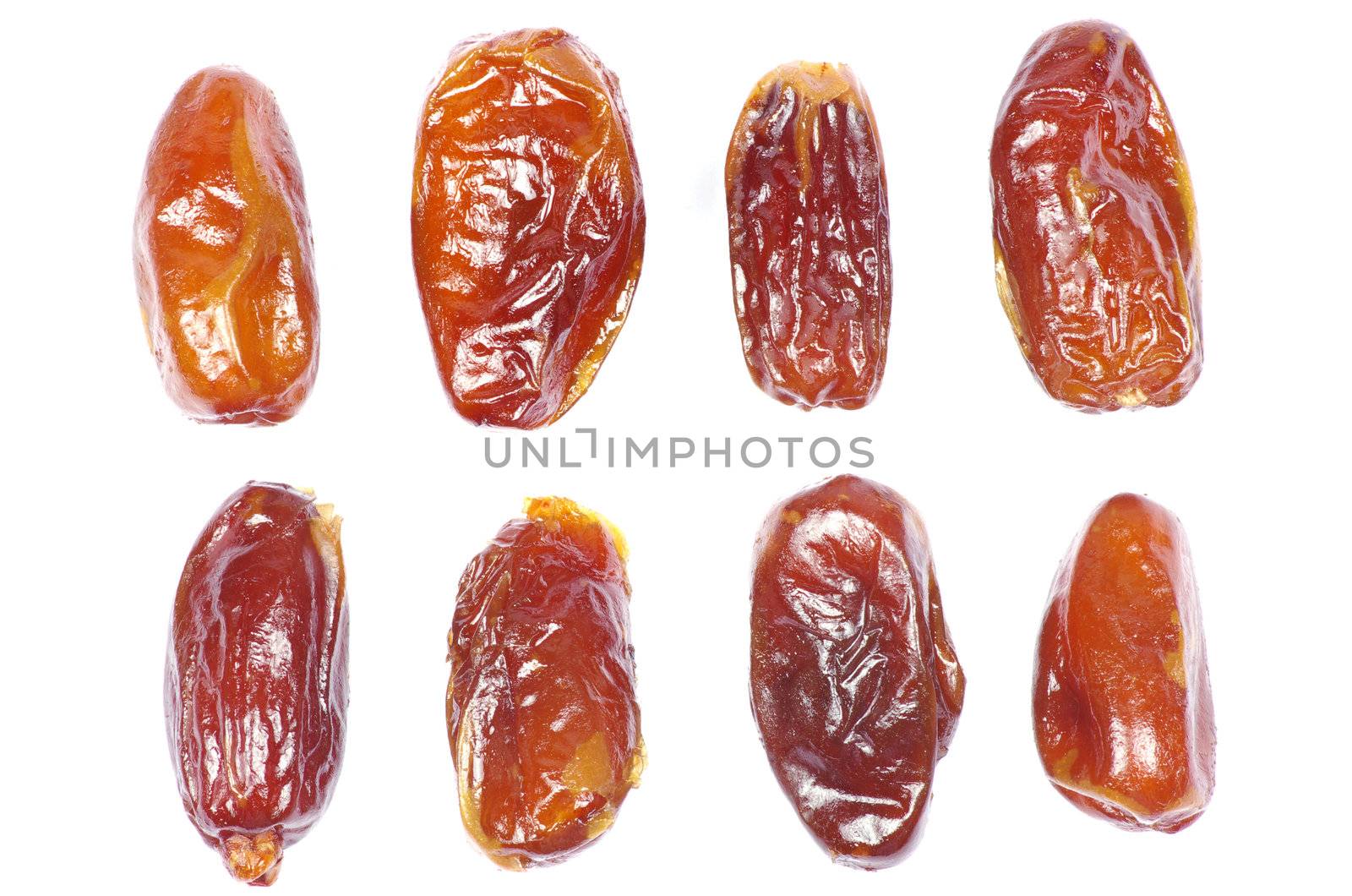 dryed dates on white background