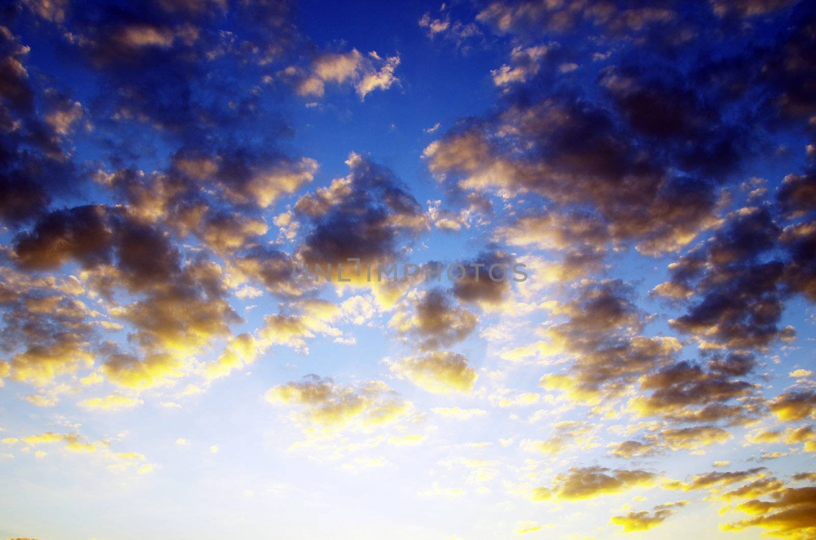 blue sky background with tiny clouds