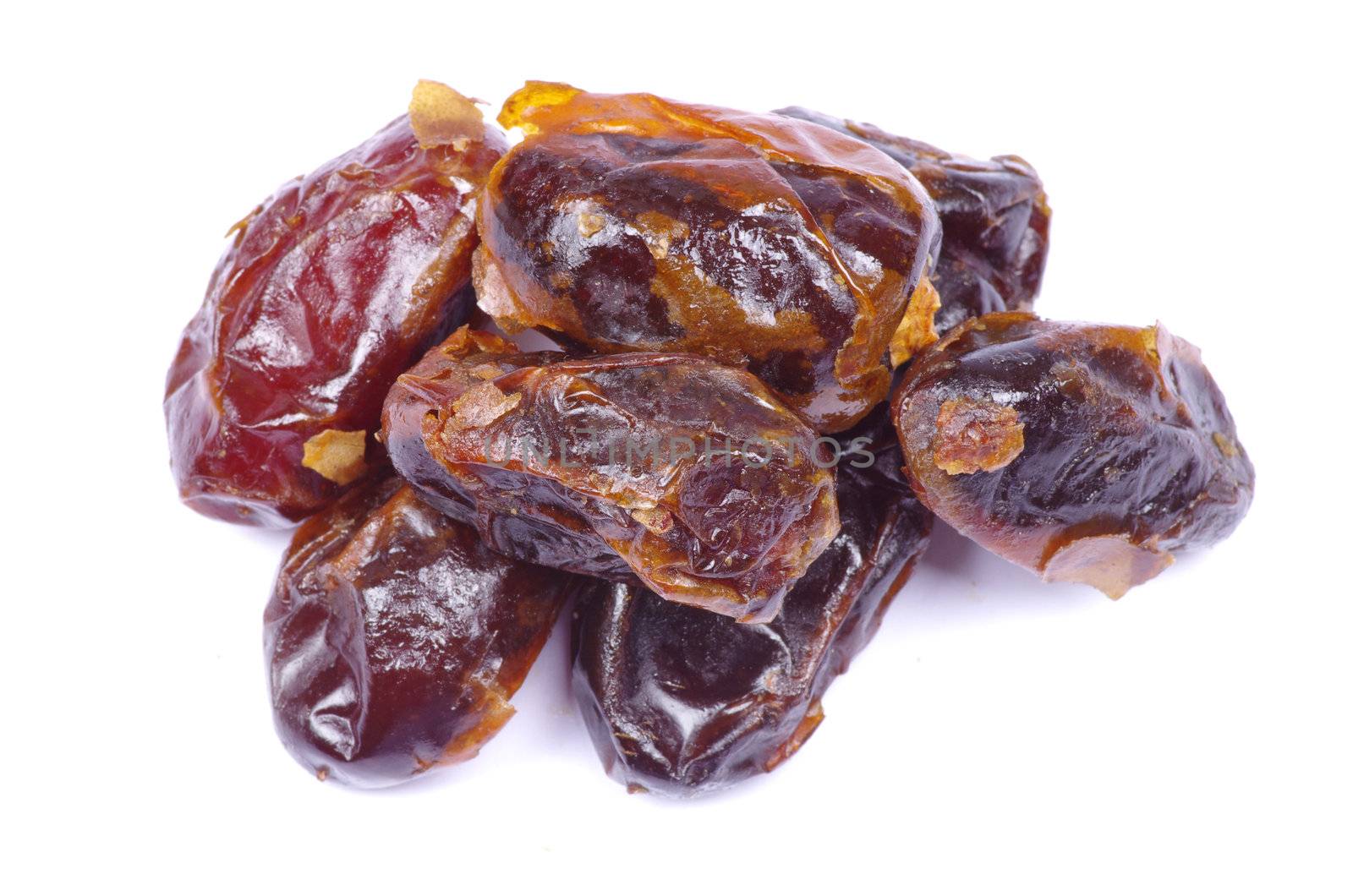 dryed dates on white background