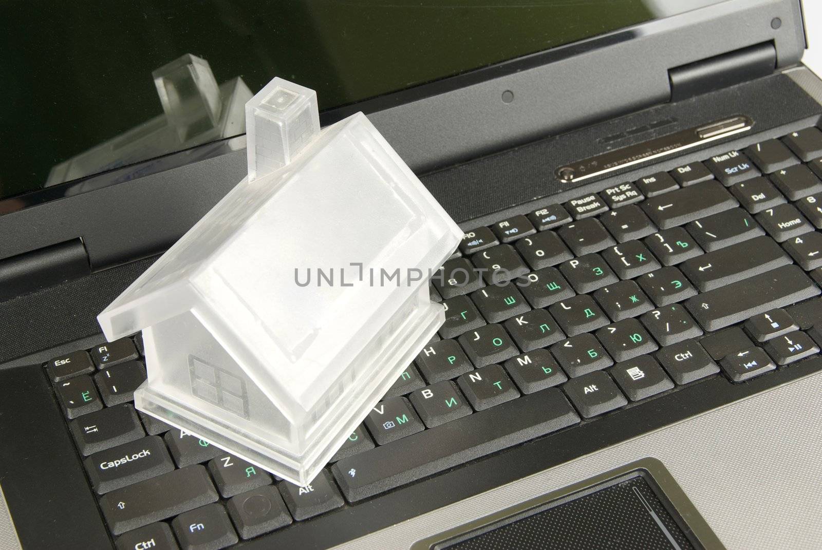 house isolated on laptop keyboard