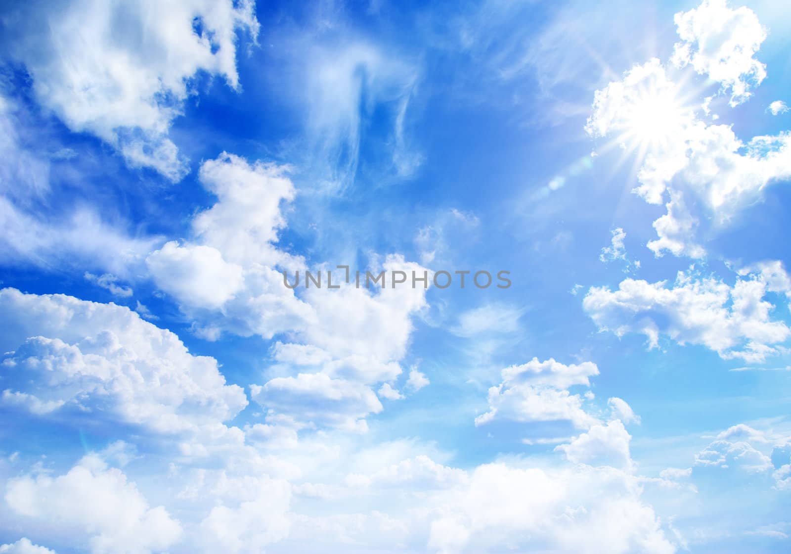 blue sky background with tiny clouds
