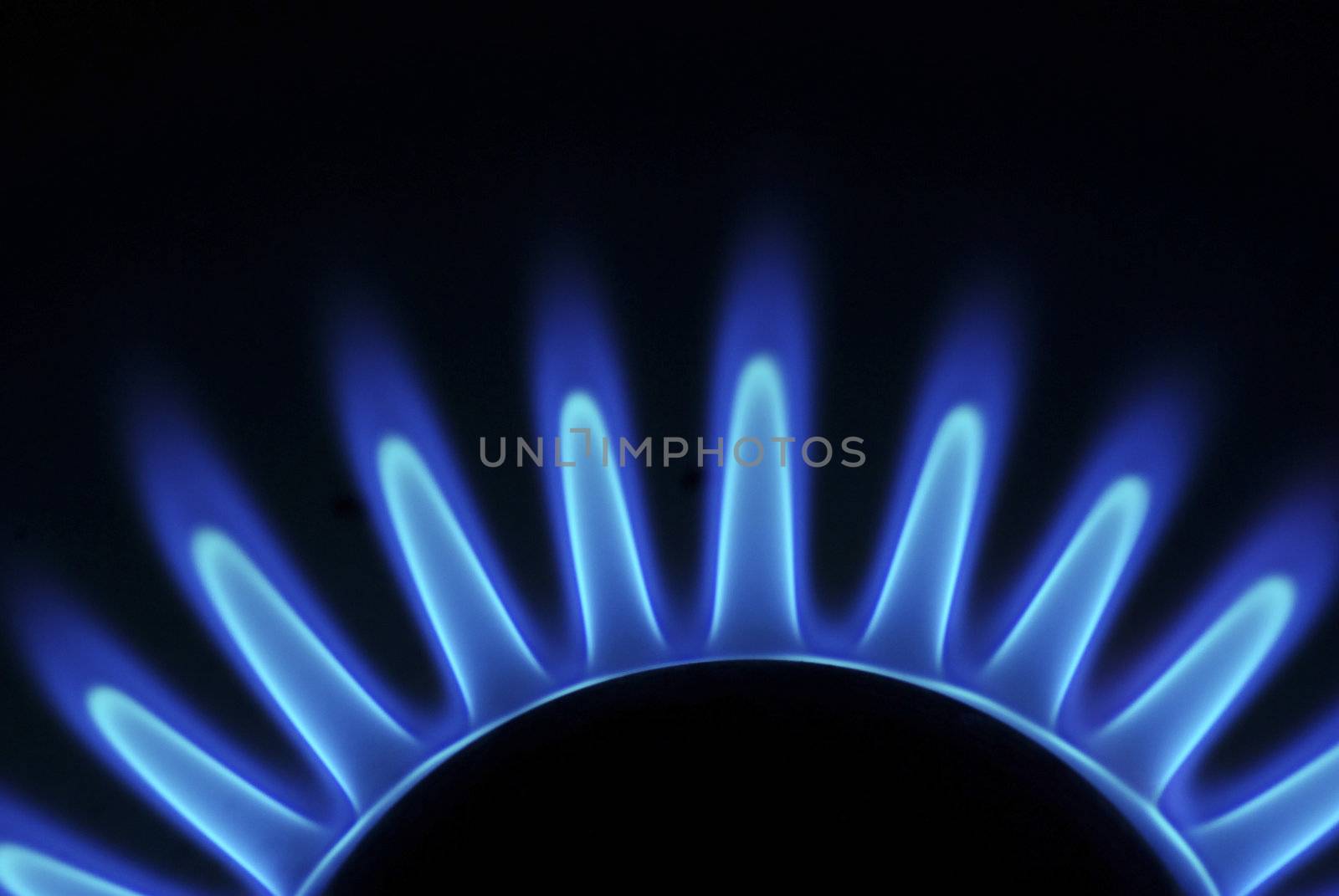 flames of gas stove in the dark