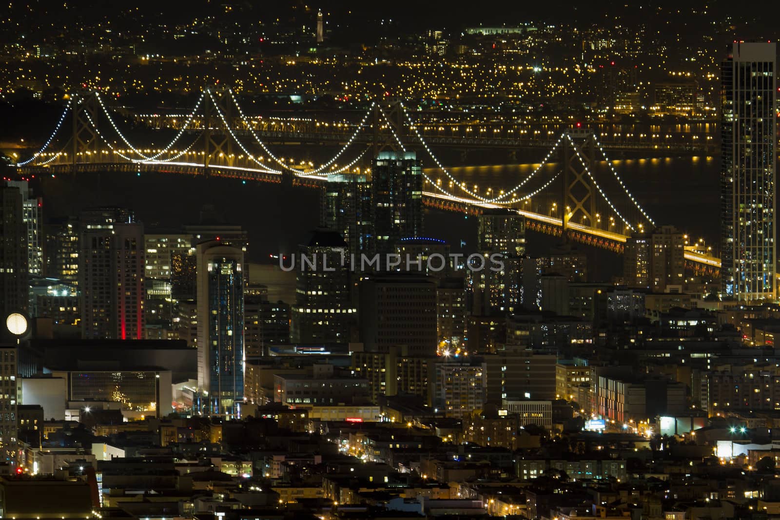 San Francisco California Cityscape with Oakland Bay Bridge Lit at Night